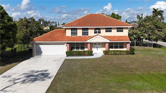 view of front of house with a garage and a front lawn