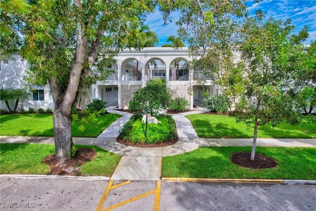 view of front facade with a front lawn