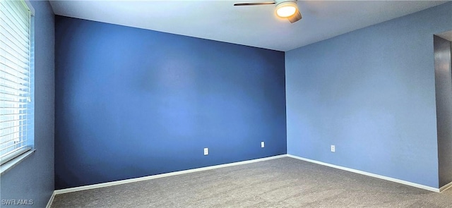 empty room featuring ceiling fan