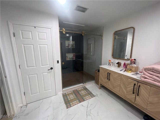 bathroom with vanity and an enclosed shower