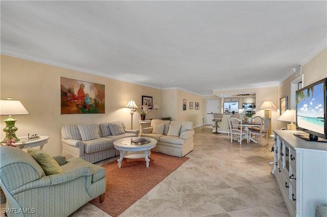 living room with ornamental molding