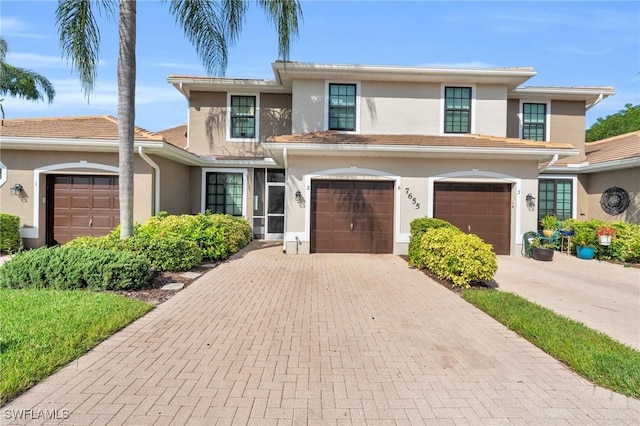 view of front of property with a garage