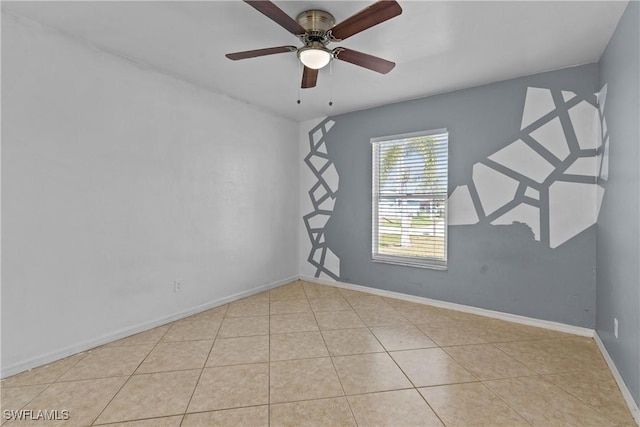 tiled empty room with ceiling fan