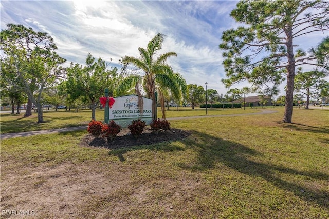 surrounding community featuring a yard