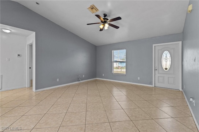 tiled entrance foyer featuring ceiling fan and lofted ceiling