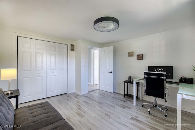 office space featuring light hardwood / wood-style flooring