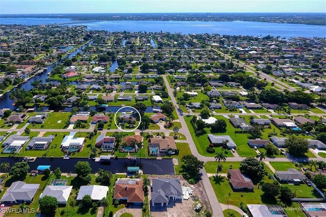 aerial view featuring a water view