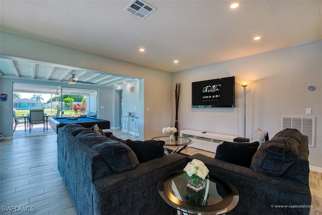 living room featuring light hardwood / wood-style floors and billiards