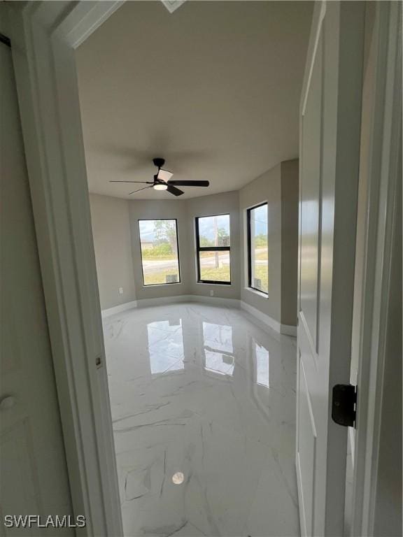 empty room with ceiling fan