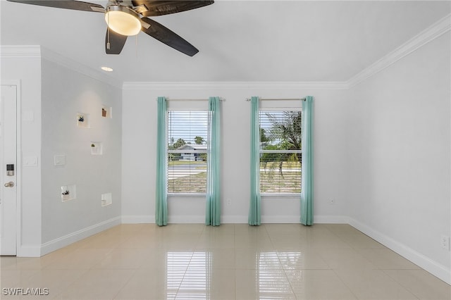 tiled empty room with ceiling fan and crown molding