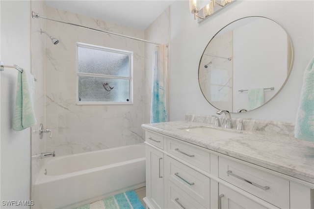 bathroom with vanity and shower / bath combo