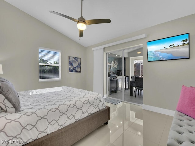 tiled bedroom featuring ceiling fan, vaulted ceiling, and a closet