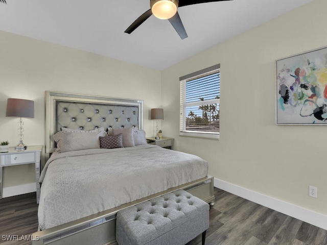 bedroom featuring ceiling fan and dark hardwood / wood-style flooring