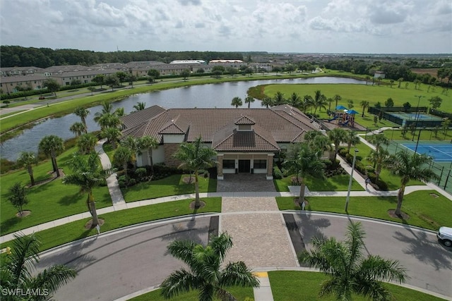 birds eye view of property featuring a water view