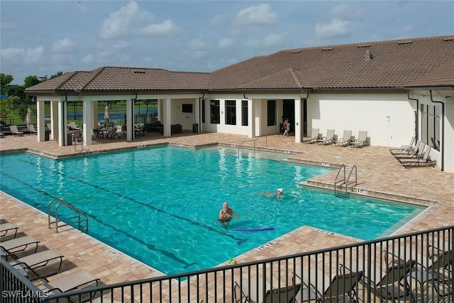 view of pool with a patio area