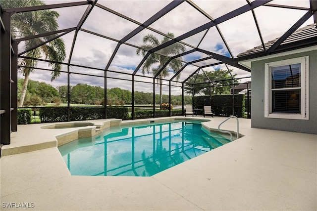 view of pool with an in ground hot tub, a patio, and a lanai