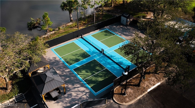 view of basketball court featuring tennis court