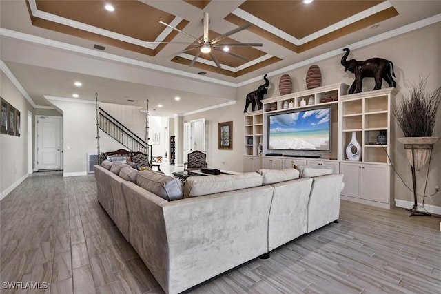 living room featuring crown molding, ceiling fan, and coffered ceiling