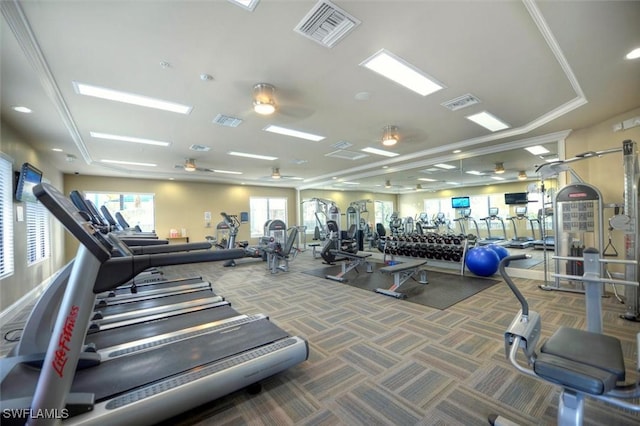 workout area featuring ceiling fan and carpet