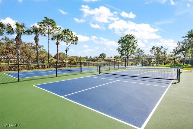 view of sport court with basketball hoop