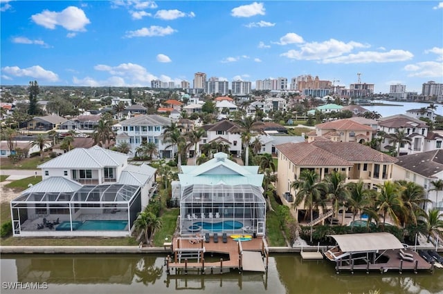 drone / aerial view with a water view