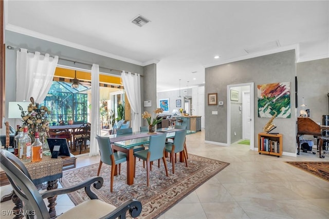 dining area with ornamental molding