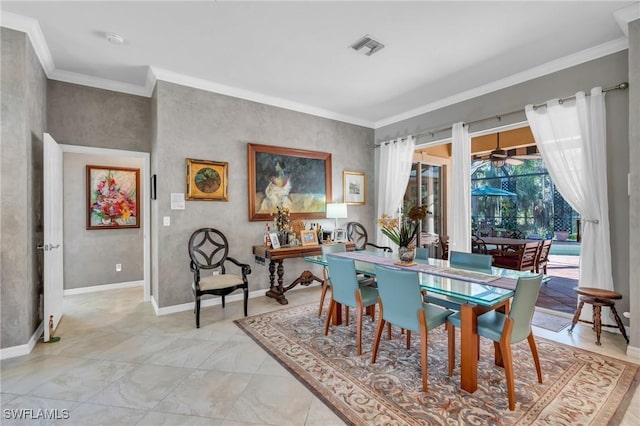 dining room featuring ceiling fan and ornamental molding