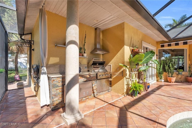 view of patio / terrace featuring area for grilling and sink