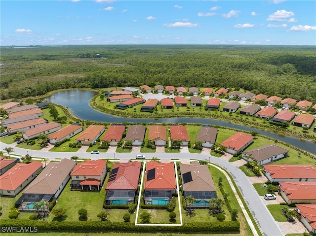 drone / aerial view with a water view