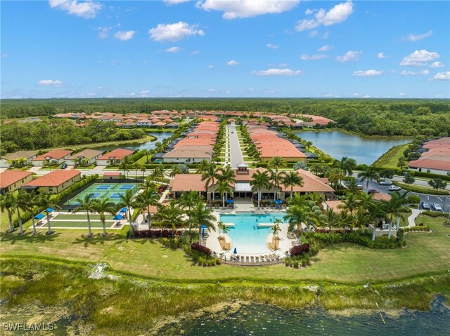 bird's eye view with a water view