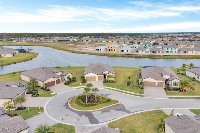 bird's eye view with a water view