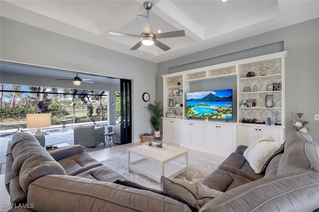 living room with beam ceiling, ceiling fan, and coffered ceiling