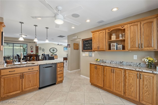 kitchen with pendant lighting, dishwasher, ceiling fan, and sink