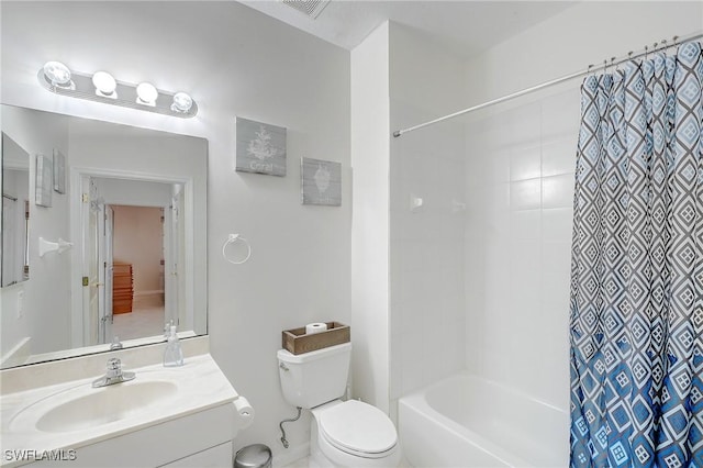 full bathroom with vanity, shower / bath combination with curtain, and toilet