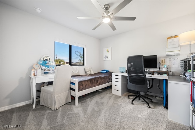 bedroom featuring light carpet and ceiling fan