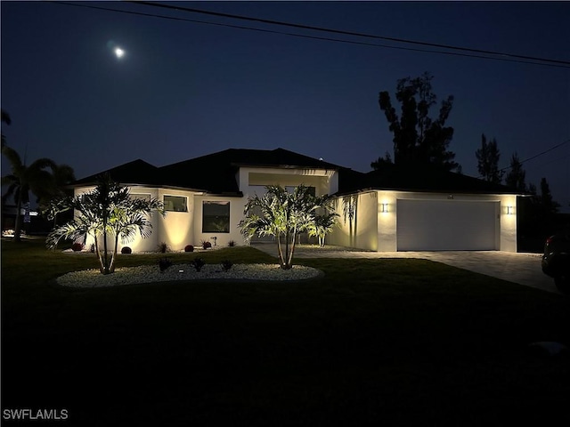 view of front of property with a garage