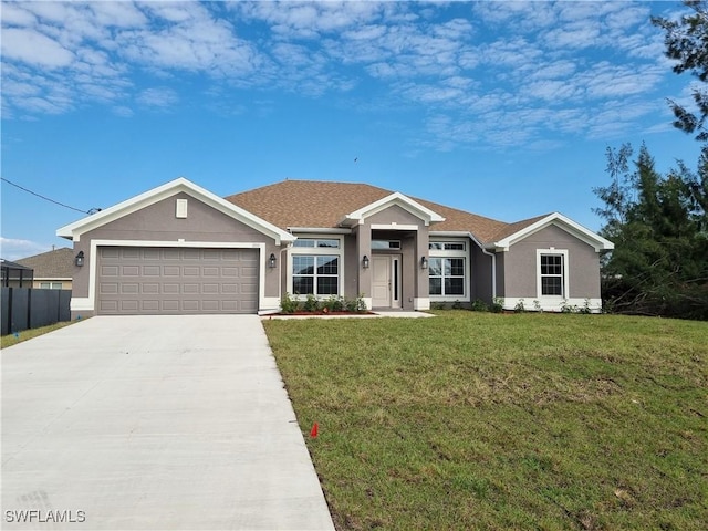 1133 NW 28th Ave, Cape Coral, FL 33993 - single story home featuring a garage and a front yard