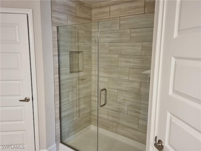 bathroom featuring walk in shower