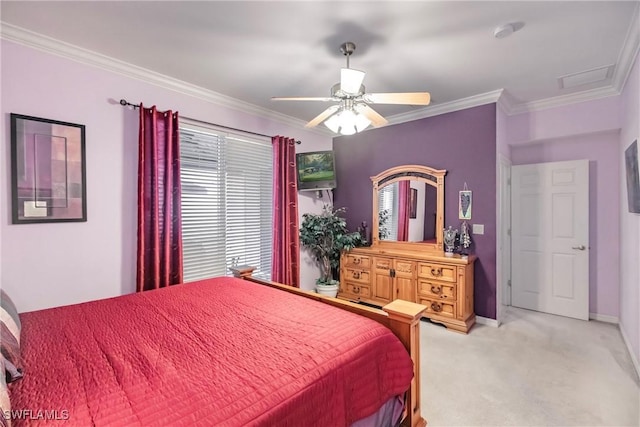 carpeted bedroom with ceiling fan and ornamental molding