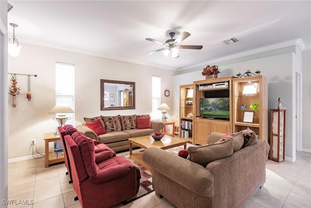 living room featuring ceiling fan, light tile patterned flooring, and ornamental molding