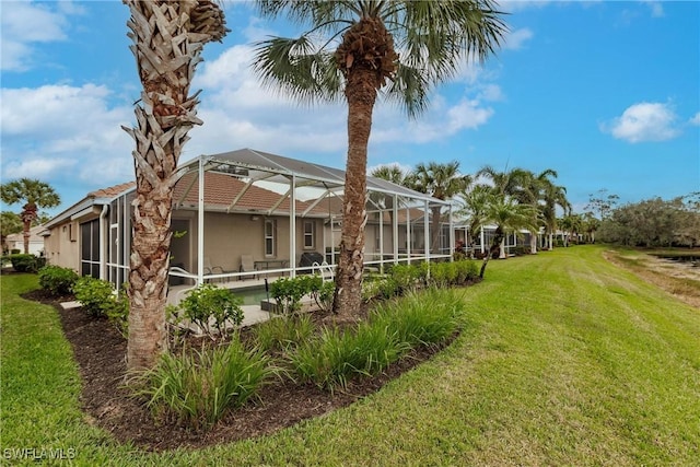 view of yard featuring a lanai