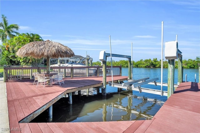 view of dock with a water view