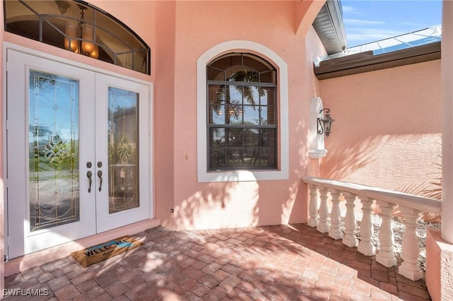 doorway to property featuring french doors