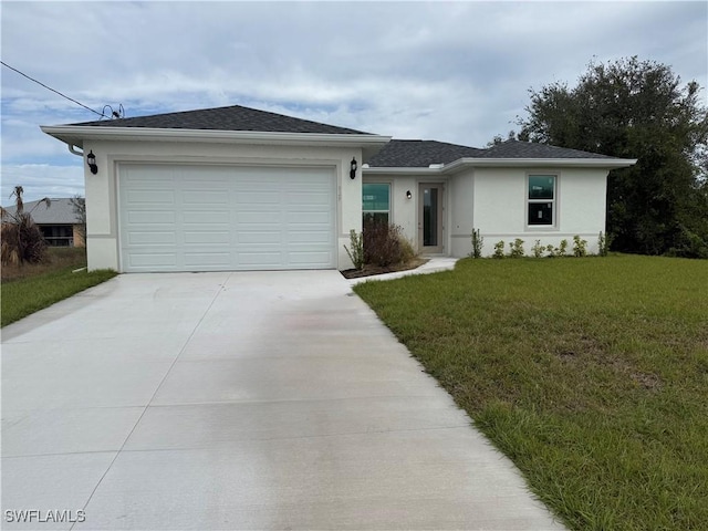 single story home featuring a front lawn and a garage