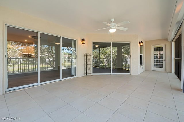 view of patio / terrace featuring ceiling fan