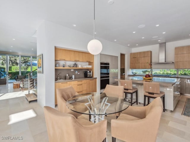 dining room featuring recessed lighting