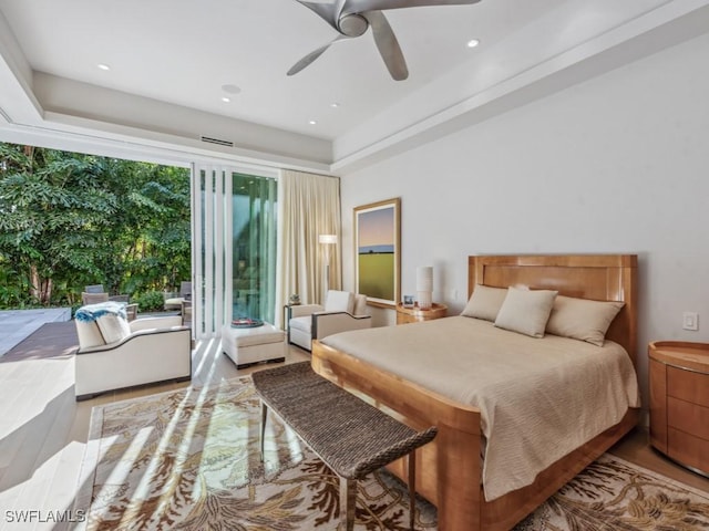 bedroom featuring a ceiling fan, recessed lighting, and wood finished floors