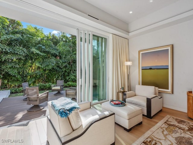 sitting room featuring light wood finished floors