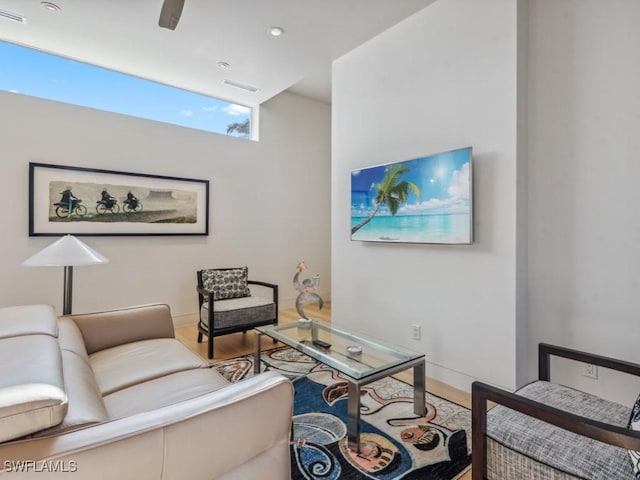 living area featuring visible vents, wood finished floors, and recessed lighting