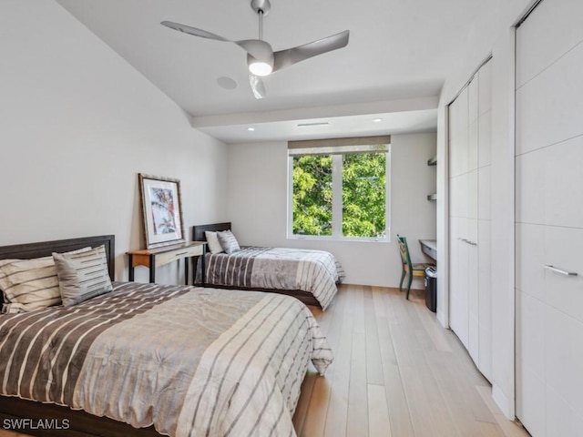 bedroom featuring a ceiling fan and light wood-style flooring